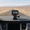 insta360 adhesive mount kit — Mounted on car dashboard, in use