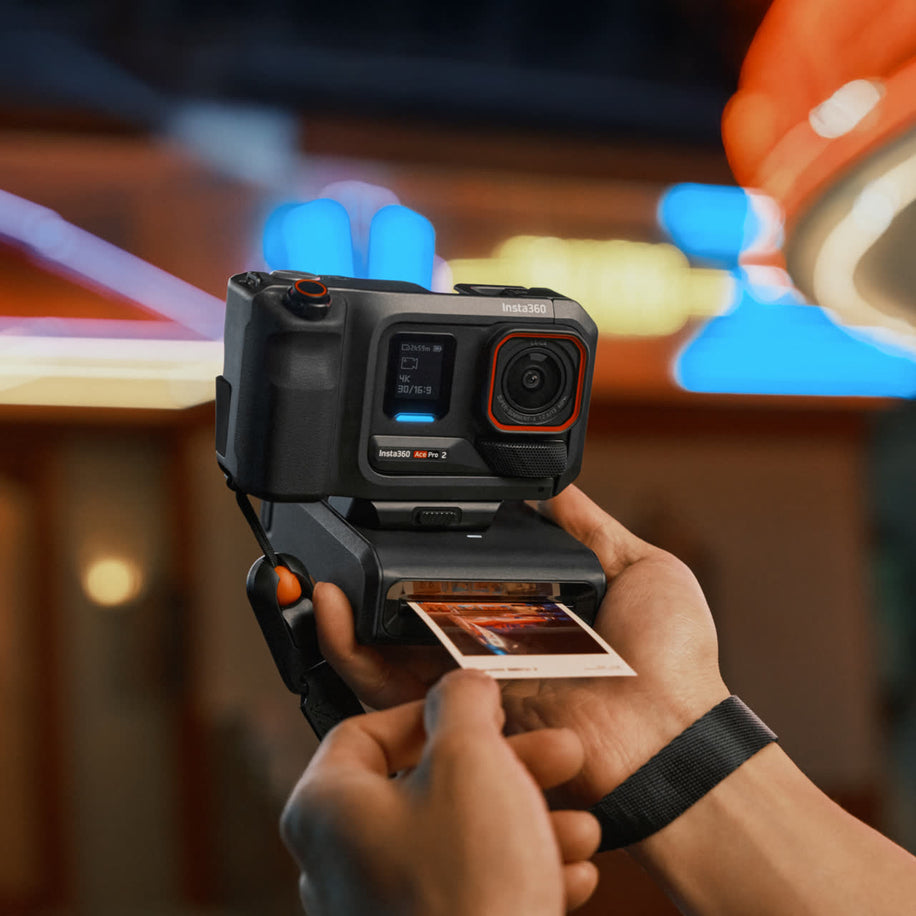 insta360 ace pro 2 photo paper cartridge — Pocket printer ejecting a print