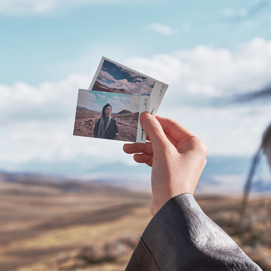 insta360 ace pro 2 photo paper cartridge — Hand holding two prints outdoors
