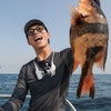 Insta360 FOMO Power Neck Mount — Fishing usage shot, camera on neck mount